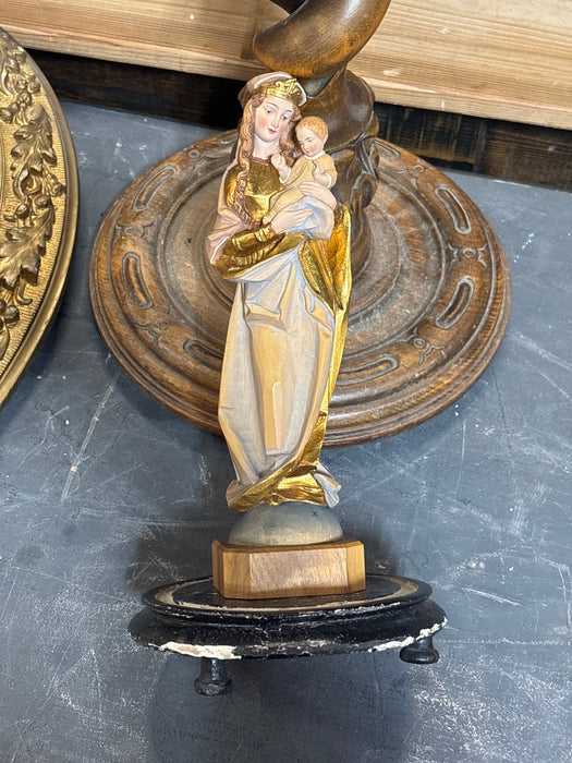 CARVED WOOD MADONNA AND CHILD IN DOME ATTACHED TO BLACK BASE