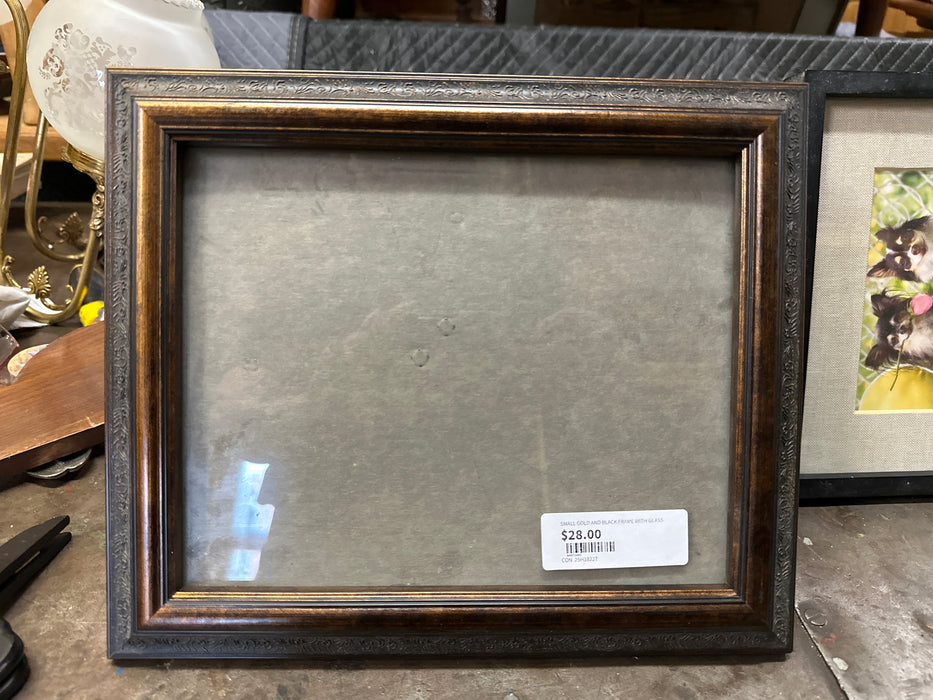SMALL GOLD AND BLACK FRAME WITH GLASS