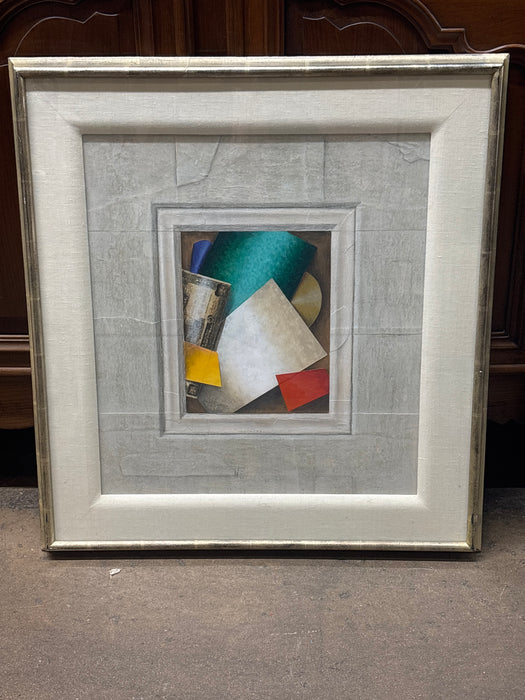 MEDIUM SILVER GILT FRAMED PRINT OF COLORFUL ASSORTMENT OF DESK PAPERS