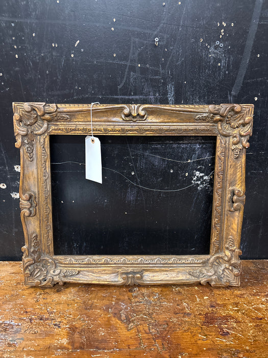 MEDIUM GILT CARVED WOOD FRAME