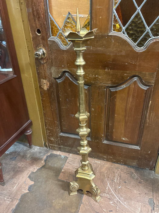 LARGE BRASS PRICKET WITH VOLUTES ON BASE