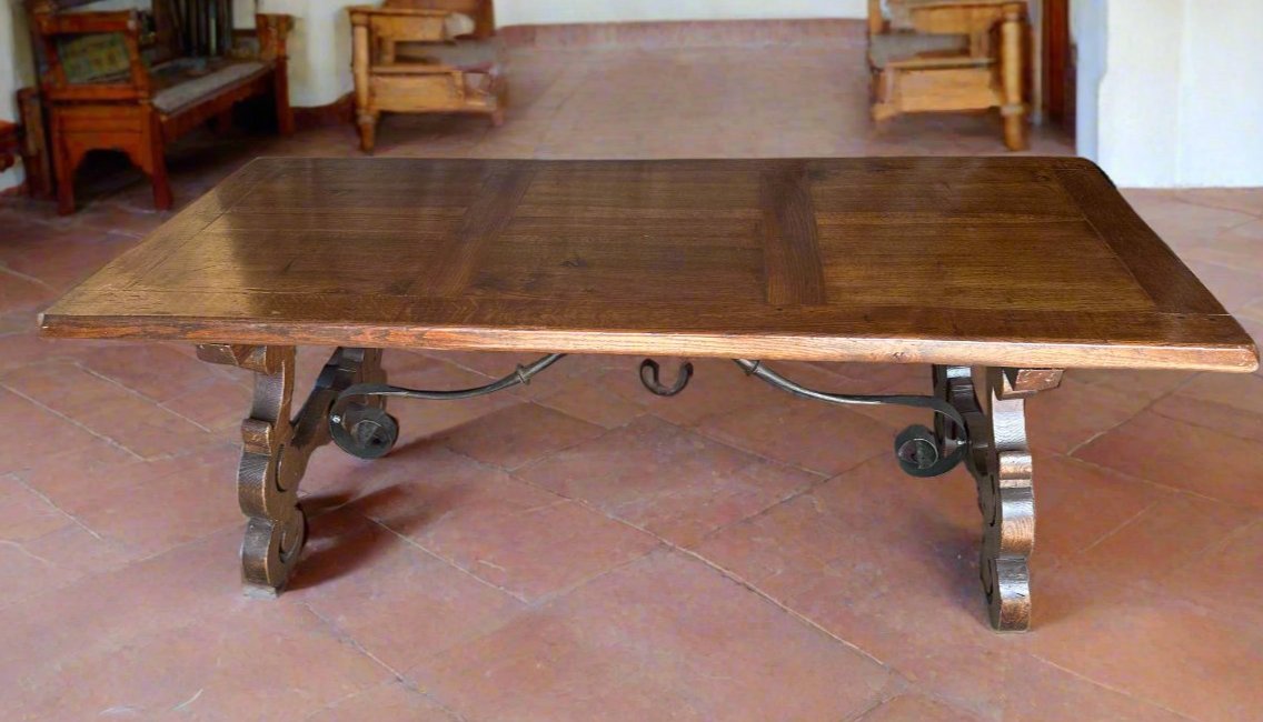 SPANISH STYLE OAK TABLE WITH IRON STRECTHER