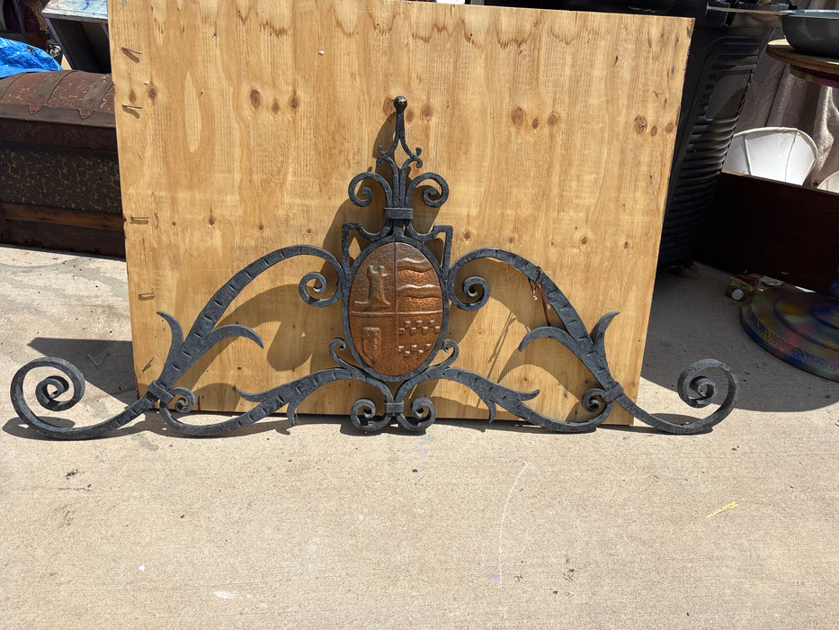 IRON PEDIMENT WITH EMBOSSED COPPER SHIELD