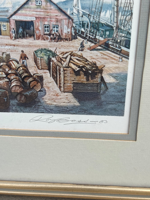 BROWN FRAMED SAILBOAT SCENE WITH AMERICAN FLAG - SIGNED ROY CROSS '83