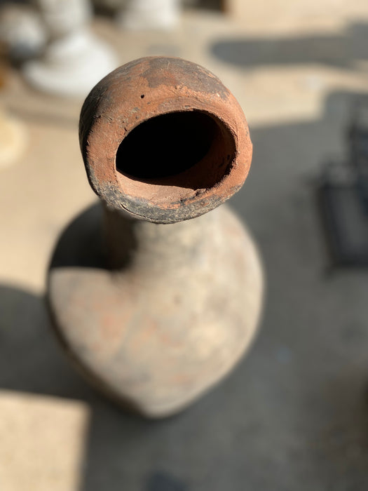 TALL TERRACOTTA JUG WITH CARVED SPOUT