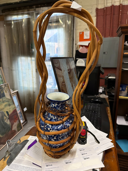 BLUE AND WHITE VASE IN BASKET
