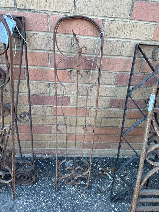 PAIR  OF IRON ARCHED PANELS WITH CIRCLES