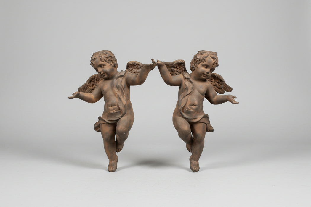 PAIR OF LARGE COMPOSITION CUPIDS