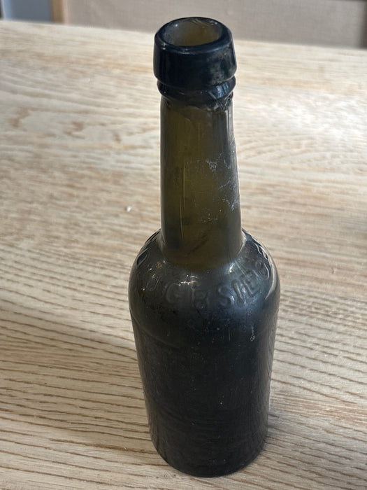 SMALL GREEN GLASS BOTTLE