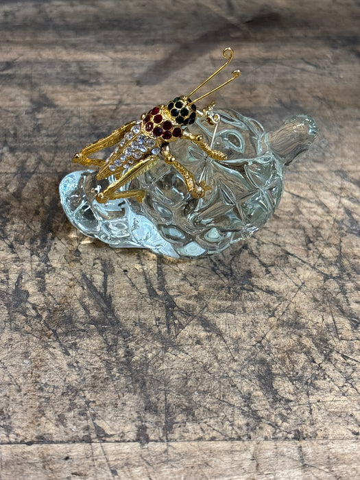 JEWELED CICADA MOUNTED TO CLEAR GLASS GRAPES
