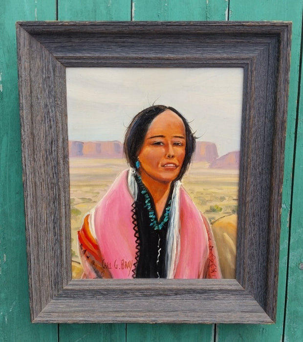 SMALL FRAMED OIL PAINTING OF AN INDIAN WOMAN SIGNED CARL BRAY