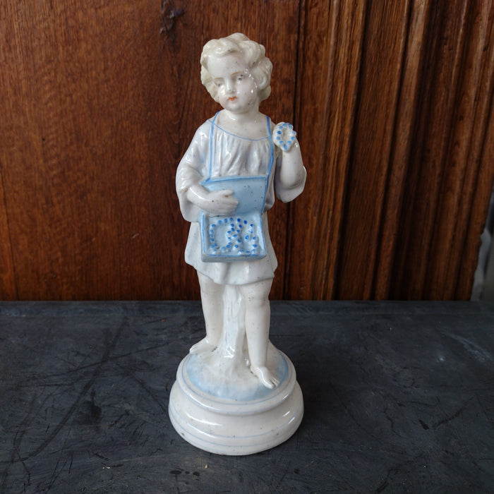 ANTIQUE BLUE AND WHITE FIGURE OF BOY