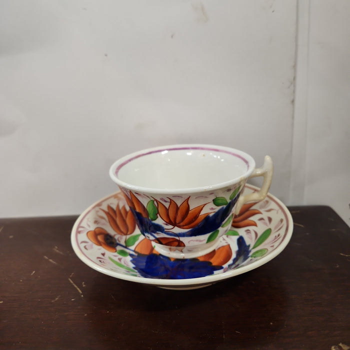 GAUDY DUTCH ENGLISH CUP AND SAUCER