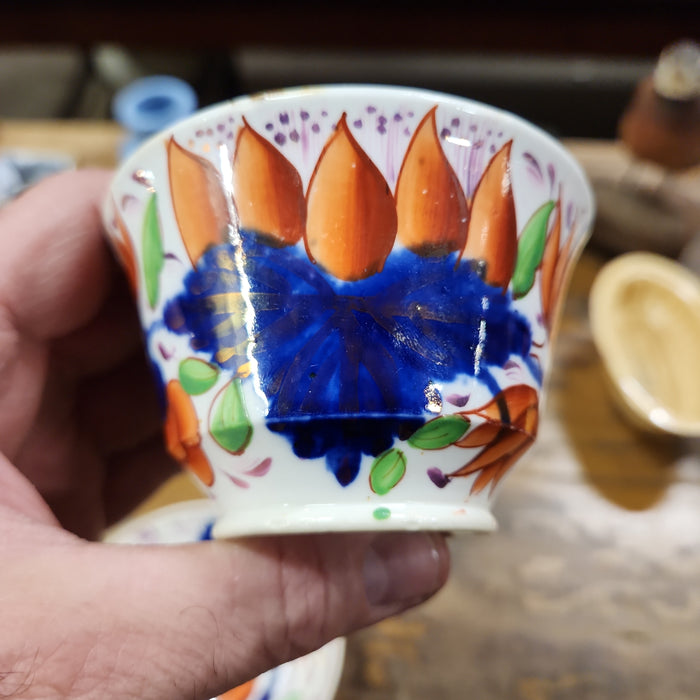 GAUDY DUTCH ENGLISH CUP AND SAUCER