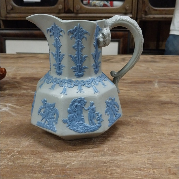 PITCHER WITH RELIEF