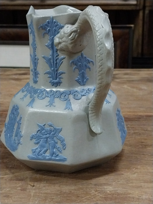 PITCHER WITH RELIEF