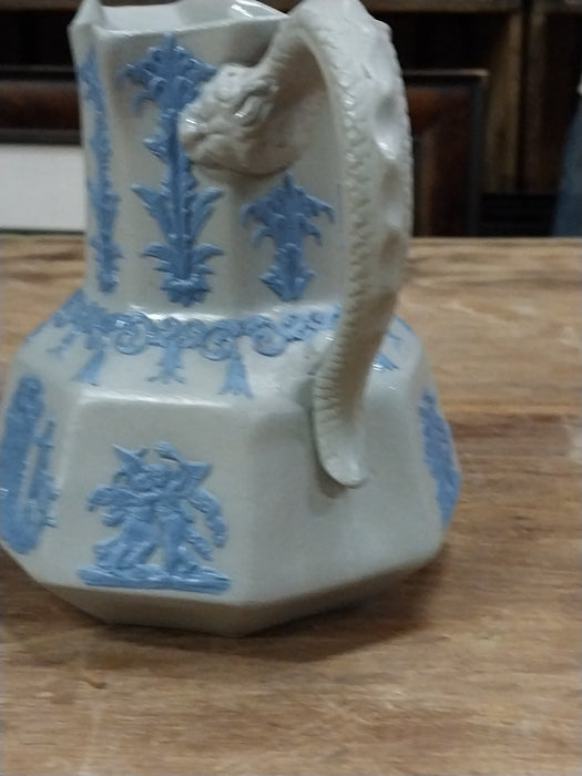 PITCHER WITH RELIEF