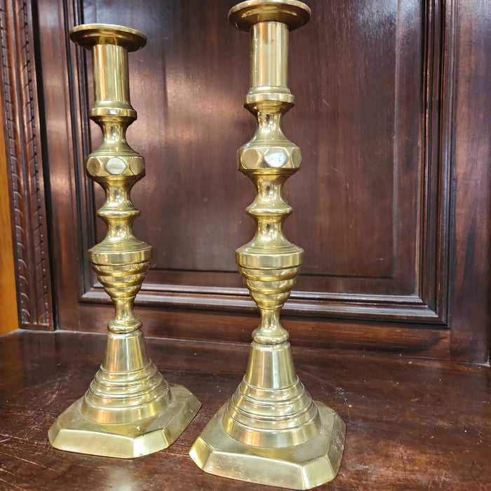 EARLY BRASS PRIMITIVE PUSH UP CANDLESTICKS PAIR