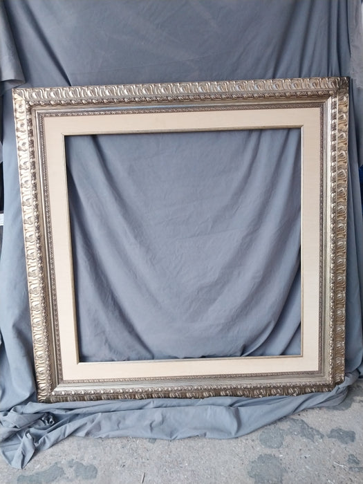 SILVER GILT CARVED WOOD FRAME