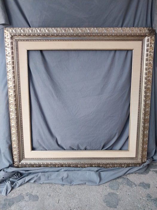 SILVER GILT CARVED WOOD FRAME