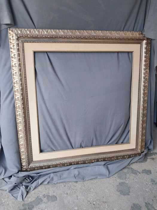 SILVER GILT CARVED WOOD FRAME