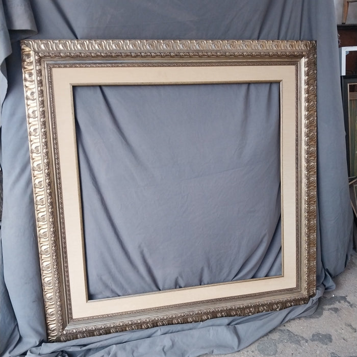 SILVER GILT CARVED WOOD FRAME