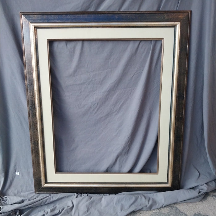 BLACK AND GILT DISTRESSED FRAME