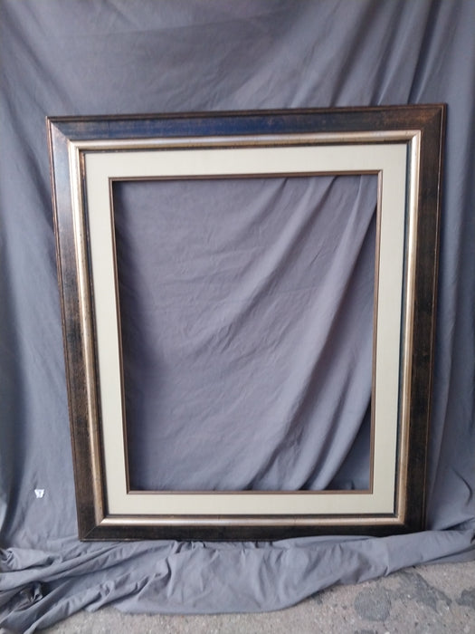 BLACK AND GILT DISTRESSED FRAME