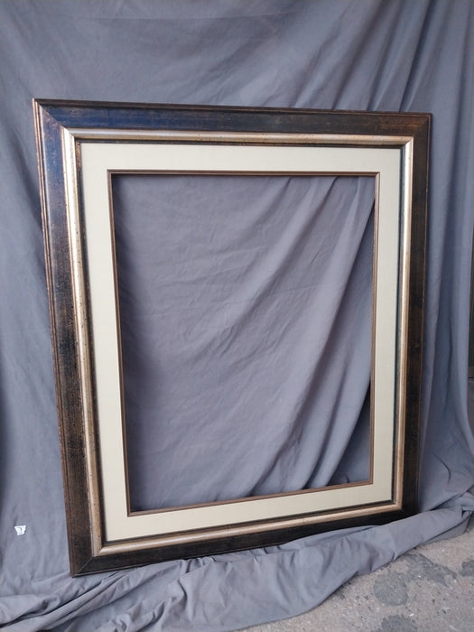 BLACK AND GILT DISTRESSED FRAME