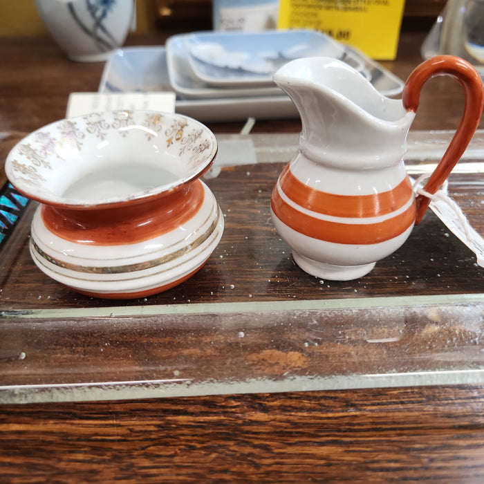 2 PIECE ORANGE AND WHITE MINIATURE BOWL AND PITCHER