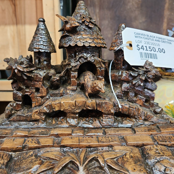 CARVED BLACK FOREST TANTULUS WITH CASTLE AND CRITTER