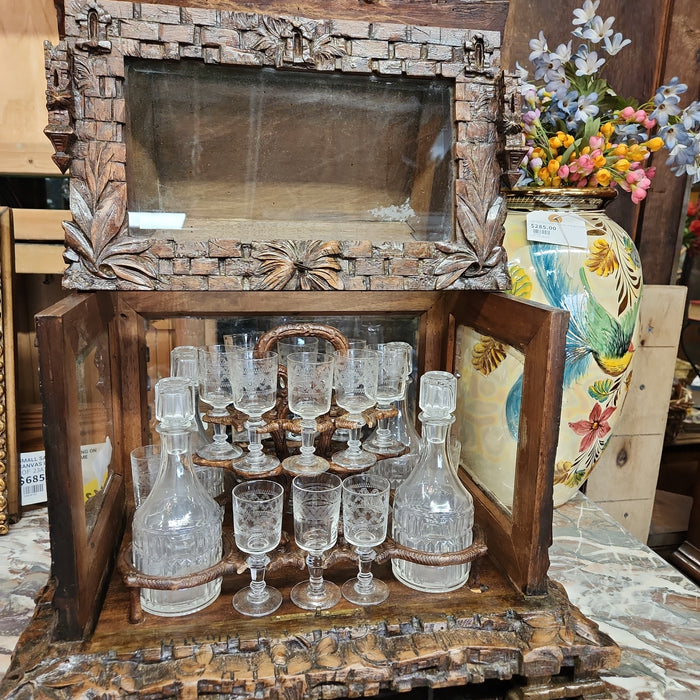 CARVED BLACK FOREST TANTULUS WITH CASTLE AND CRITTER