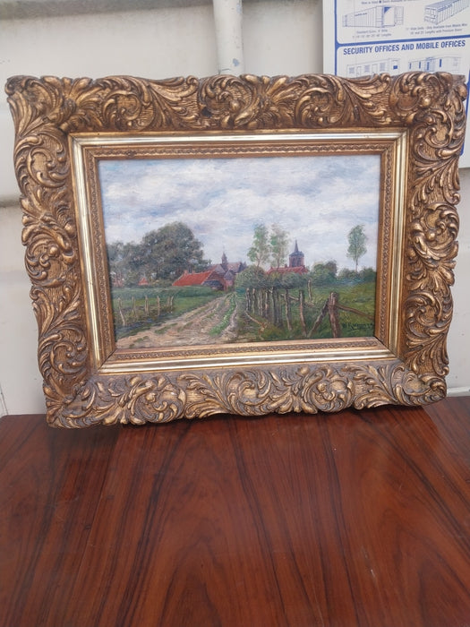 RUSTIC OIL PAINTING "CHURCH IN THE COUNTRY" IN ORNAYE GILT FRAME