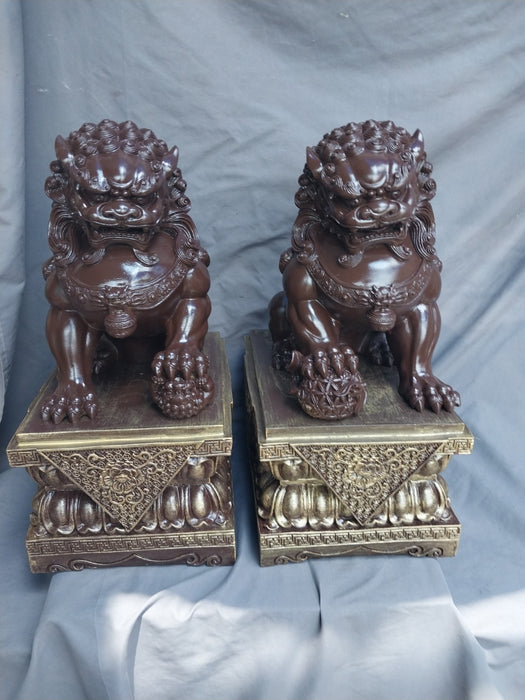 PAIR OF COMPOSITION FOO DOGS