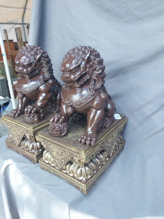PAIR OF COMPOSITION FOO DOGS