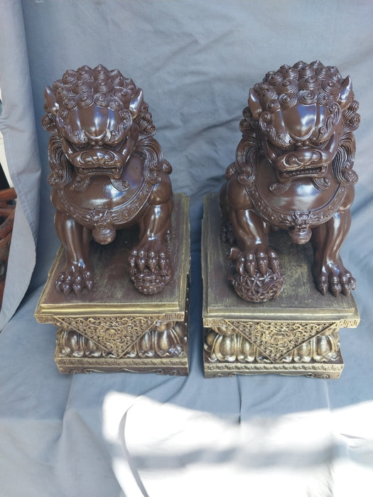 PAIR OF COMPOSITION FOO DOGS
