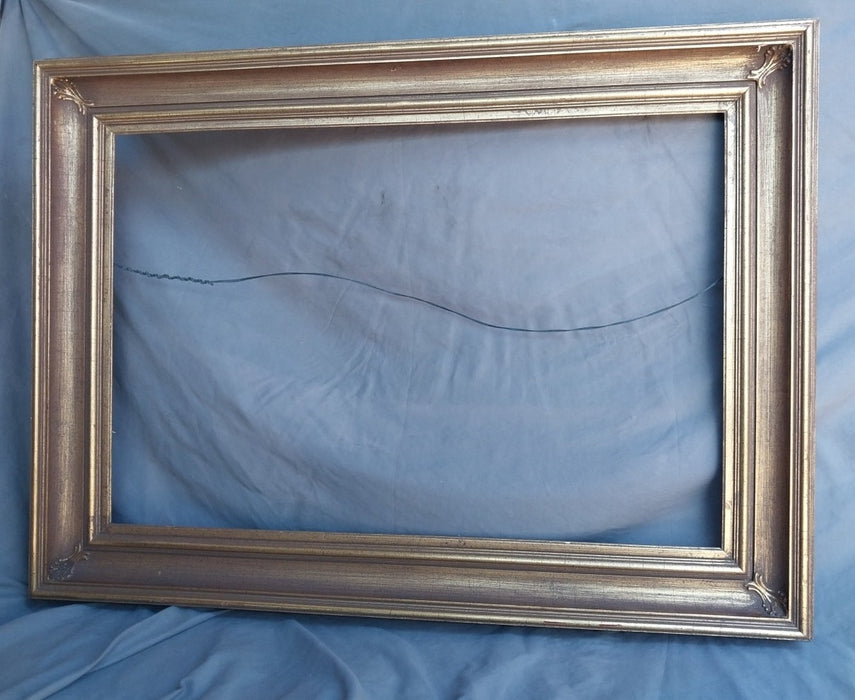 BROWN & GILT WOOD FRAME