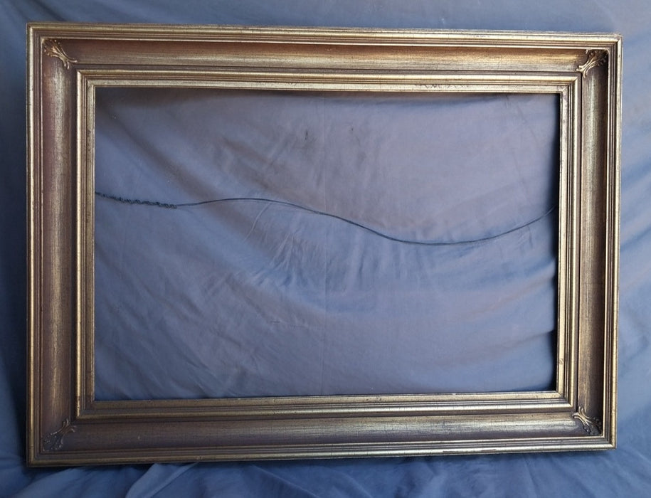 BROWN & GILT WOOD FRAME
