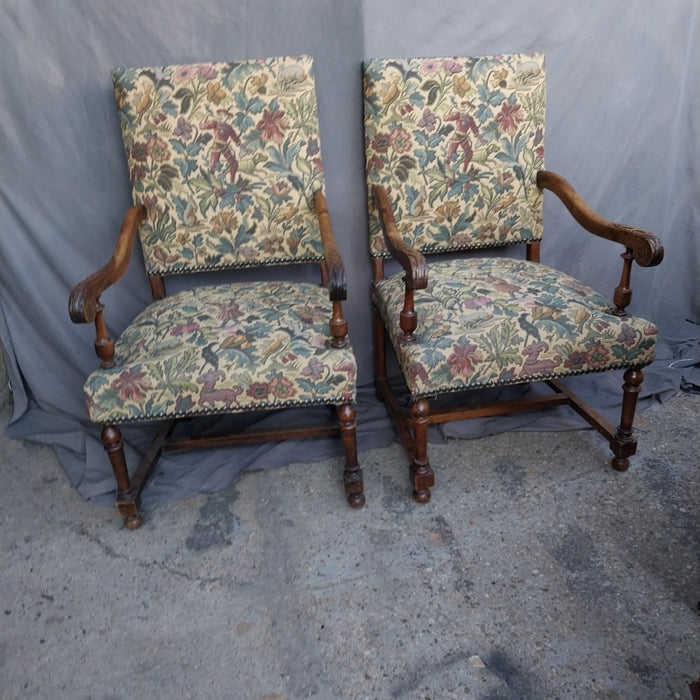 PAIR OF LOUIS XIII WALNUT FEATHER CARVED ARM CHAIRS