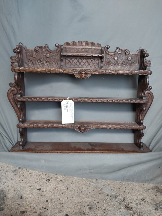 ORNATE FRENCH DARK OAK PLATE RACK WITH CHERUB HEADS