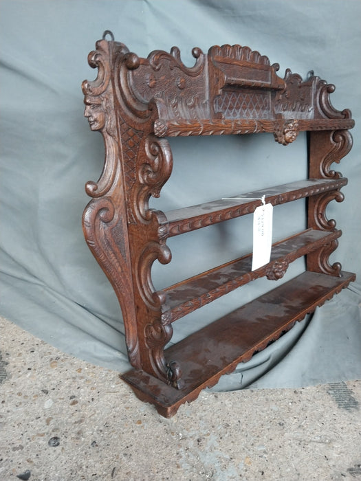 ORNATE FRENCH DARK OAK PLATE RACK WITH CHERUB HEADS