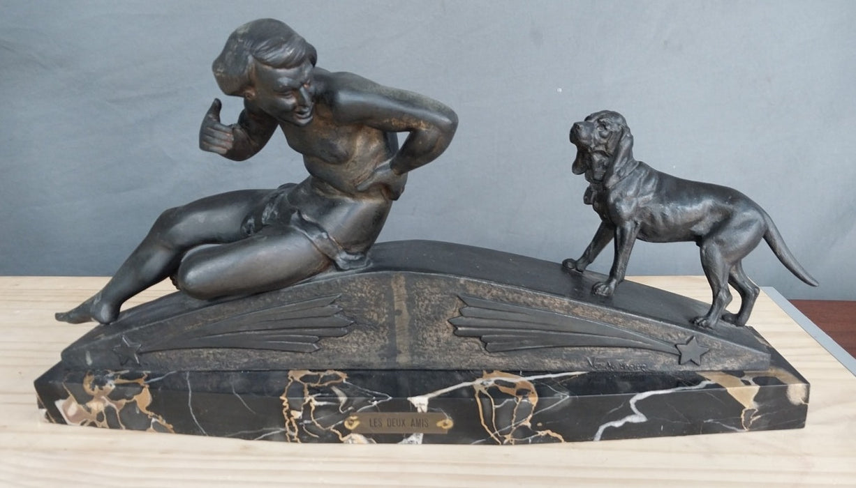 SPELTER ART DECO FIGURE WITH DOG ON MARBLE