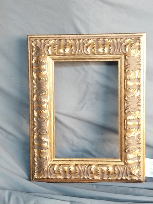 SMALL CARVED GILT WOOD FRAME