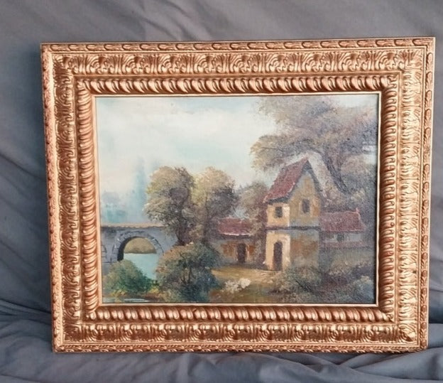 SMALL ORNATE FRAMED COTTAGE OIL PAINTING WITH BRIDGE