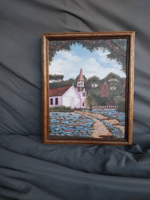 SMALL FRAMED OIL PAINTING OF CHURCH WITH BLUEBONNETS