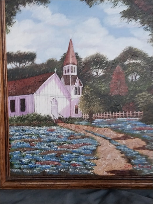 SMALL FRAMED OIL PAINTING OF CHURCH WITH BLUEBONNETS