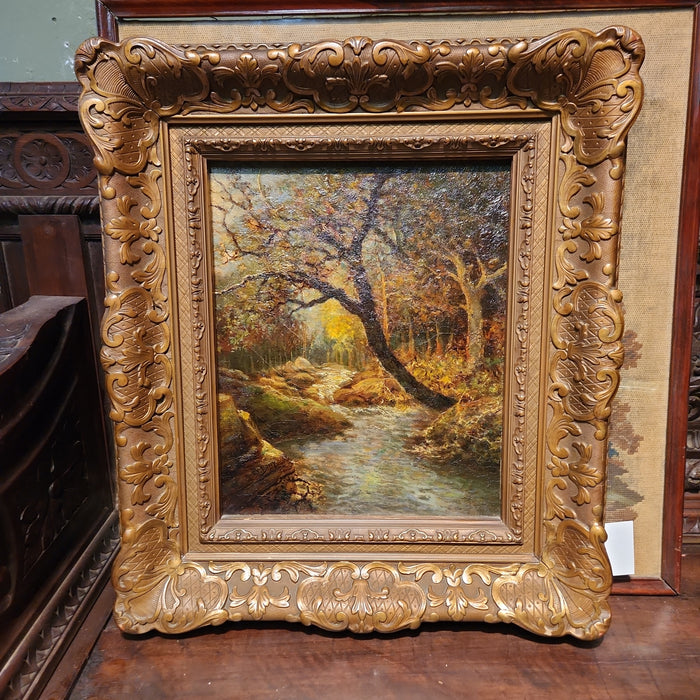 SYLVAN BROOK VERTICAL PAINTING ON CANVAS IN ORNATE GILT FRAME