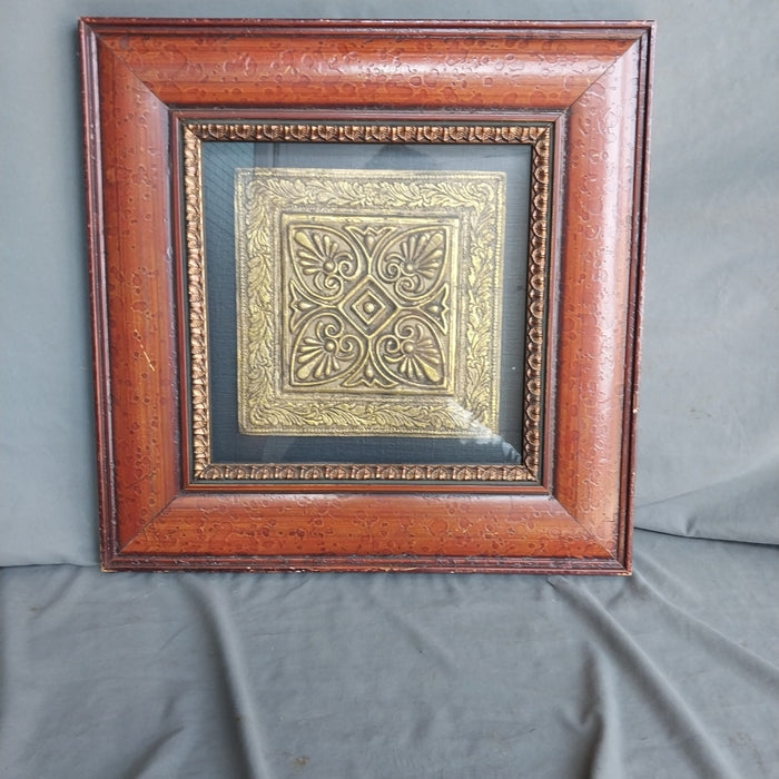 GOLD RELIEF SQUARE MEDALION IN BURNT UMBER FRAME