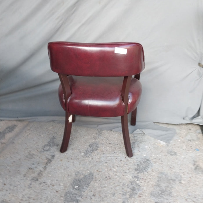RED LEATHER ARM CHAIR -AS FOUND