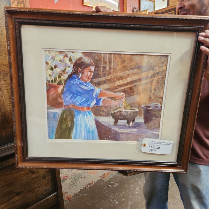 FRAMED WATER COLOR PAINTING OF AN INDIAN WOMAN COOKING